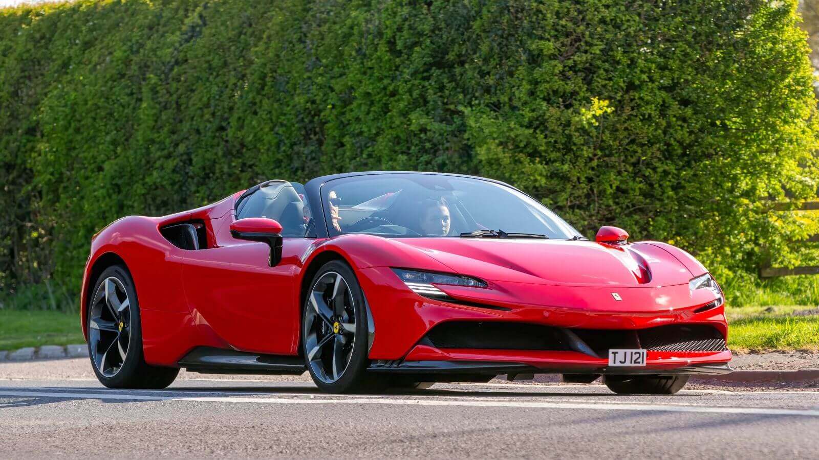 A red Ferrari vehicle_ Image by Sue Thatcher via Shutterstock_